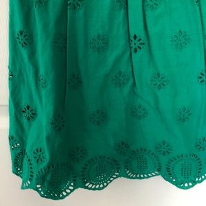 Green dress. Wonderful details.